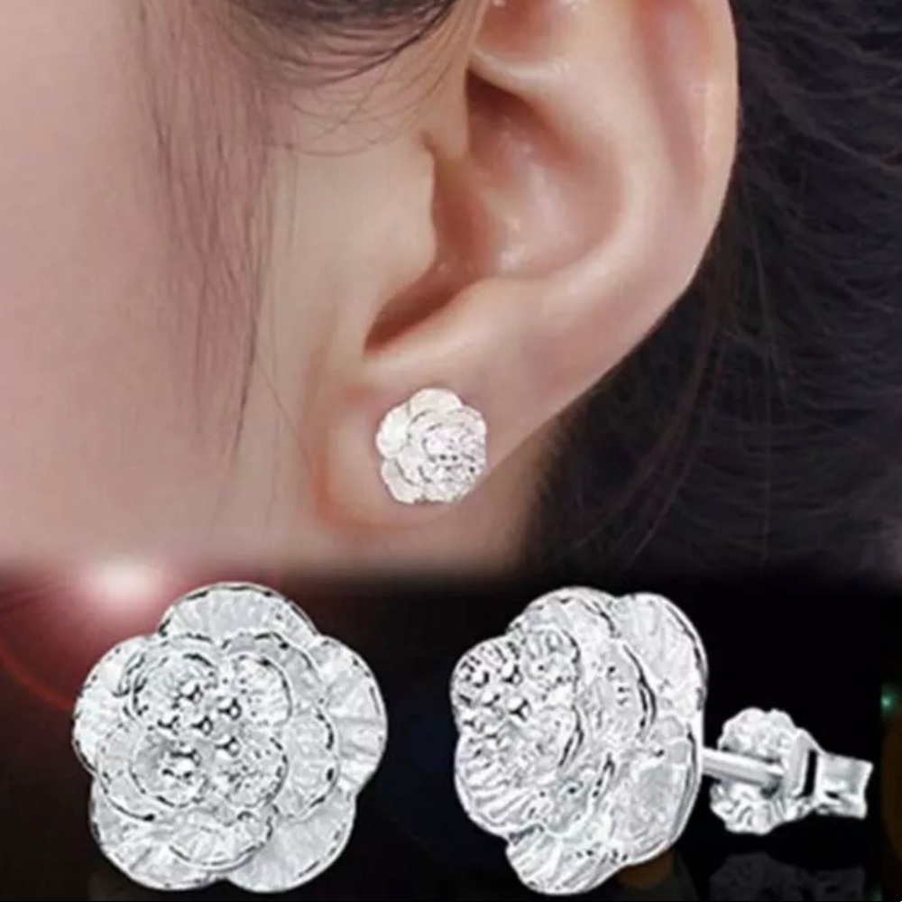 925 rose earrings in box.